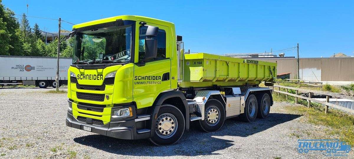Tekno Schneider Scania Next Gen G-Serie Hakenliftmotorwagen + Hakenliftcontainer 85720
