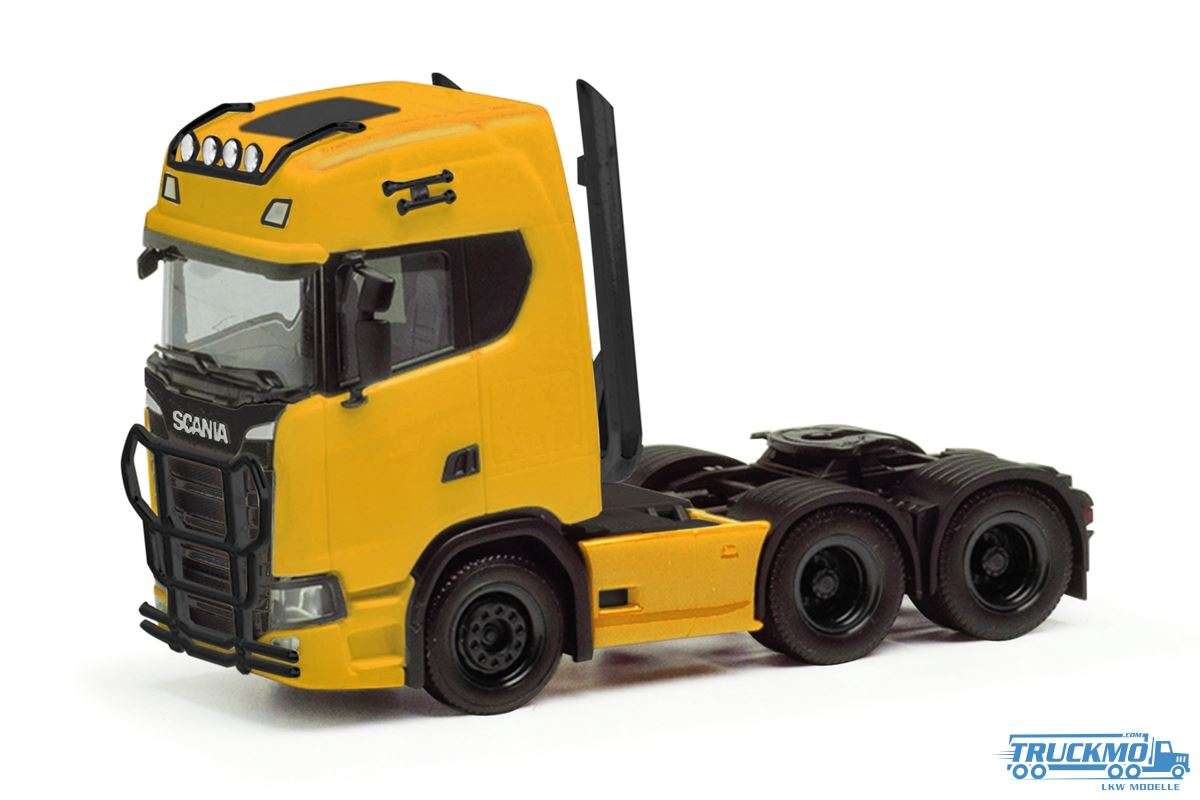 Herpa Scania CS20HD tractor unit 3-axle with lamp bracket + impact protection + highpipes yellow 314053-003